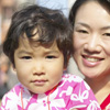 mother and child smiling